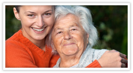 Elderly Woman and Volunteer