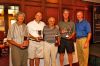 Second Place Team - Lowest Gross Score. Richard Ramirez, Mark     Bennett, Moeed Khan, and Mark Nelson pictured with Monsignor Cox,     Executive Director of Catholic Charities.