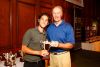Closest to the Pin winner Todd Newhouse pictured with Monsignor    Cox, Executive Director of Catholic Charities.