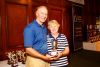 Women's Longest Drive winner Sue D'Amico pictured with Monsignor    Cox, Executive Director of Catholic Charities.