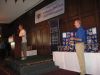 Harold Greene, Master of Ceremonies, and Rev. Monsignor Gregory A.     Cox, Executive Director of Catholic Charities at the Golf Tournament     awards reception.
