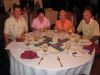 Harold and Chuckie Greene and Diane and Dr. Peter Vogelsang enjoy    the golf tournament awards reception.
