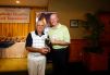 First Place Putting Contest Winner, Moeed Khan, with Msgr. Cox
