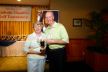 Women's Longest Drive Winner, Sue D'Amico, with Msgr. Cox