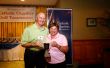 Women's Closest to the Pin Winner, Chuckie Greene, with Msgr. Cox